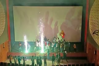 Appu fans burst fire crackers inside theatre