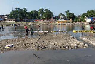 Disregarding rules of NGT Chhath ghat build in middle of Mahananda river in Siliguri