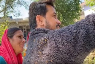 Union Minister Anurag Thakur takes selfie with rural women