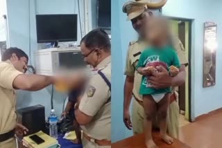 Policemen turn baby sitters