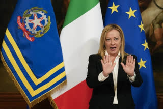 Italy's new, far-right leader heads to EU HQ to break ice
