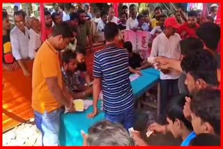 People rush to buy lottery tickets at Howly Raas Mahotsav