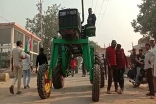 The farmer made a 10 feet tall tractor