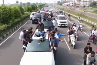 jana-sena-president-actor-pawan-kalyan-rides-on-top-of-car-video-viral