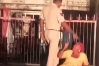 Policeman kicks Old Lady