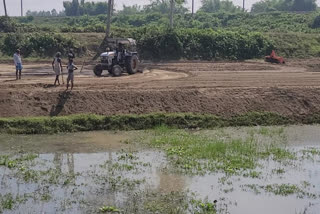 malda landRiver being filled with soil and sold in plots allegedly By TMC in Malda