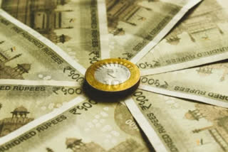 Rupee gains 45 paise to close at 81.47 against US dollar