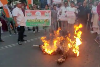 Congress demands suspension of cop for 'biting' job seeker, burns effigy of Mamata Banerjee