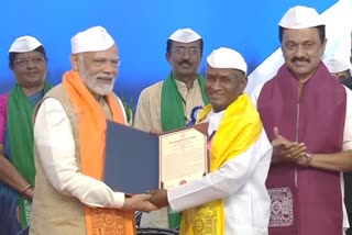 Prime Minister Narendra Modi presents an honorary doctorate to music maestro Ilayaraja at the 36th Convocation Ceremony of Gandhigram Rural Institute, Dindigul.