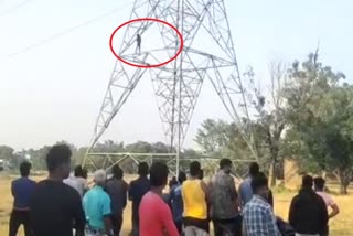 Youth on high tension tower Jamtara