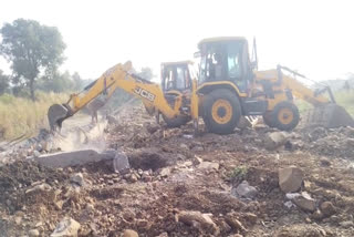 mandsaur bulldozer demolish boundary wall