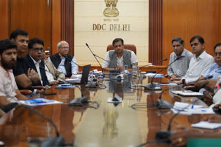 Officials at Dialogue and Development Commission of Delhi meeting