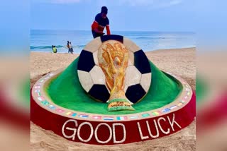 FIFA World Cup trophy in sand art
