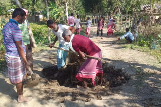 BJP Workers Repair Road