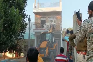 bulldozer run on house of accused