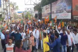 BJP took out huge procession in Deoghar