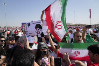 Iran regime supporters confront protesters at World Cup game