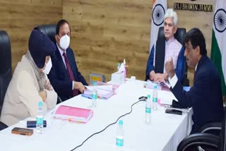 JK governor in a meeting