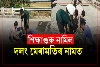 Retired Teacher Came out to constract poor road in Lakhimpur