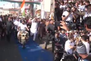 MP Rahul Gandhi rides a motorbike