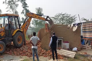 bulldozer action in faridabad