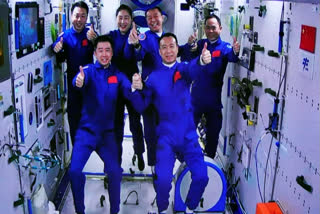 Chinese spaceship with 3 aboard docks with space station