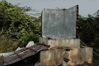 Woman dies as water tank collapses