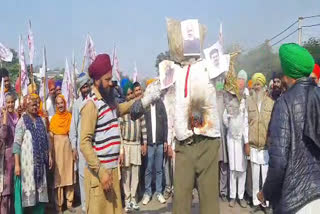 farmers blew effigies of Modi and the Punjab