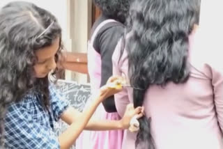Kerala: To protest moral policing, college students cut hair, form human chain