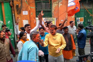 BJP members in Kolkata celebrate the victory after Gujarat Assembly Election Result 2022 out