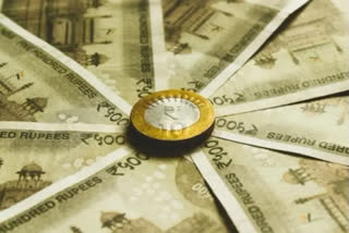 Rupee rises 12 paise against US dollar