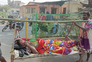 people take patient to hospital on cot