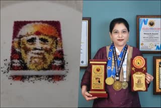 created-world-record-by-making-smallest-portrait-rangoli-of-sai-baba