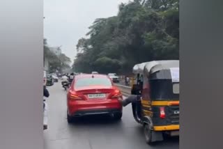 A car from a rickshaw to a garage