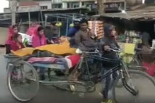 Eight-year-old boy carries grandmother to the hospital on handcart