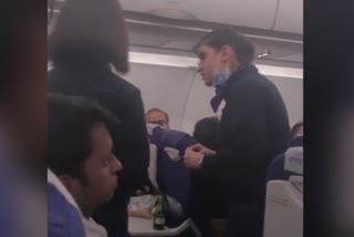 Indigo  Indigo Airlines  Fight among Airhostess and Passenger  Airhostess  Passenger  Video goes viral  വേലക്കാരി  എയര്‍ ഹോസ്‌റ്റസും യാത്രക്കാരനും  തര്‍ക്കം  വീഡിയോ  വൈറല്‍  ഇന്‍ഡിഗോ  വിമാനത്തില്‍  ന്യൂഡല്‍ഹി  എയര്‍ ഹോസ്‌റ്റസ്  എയര്‍  കമ്പനി