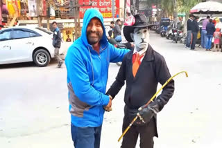 'Charlie Chaplin' entertains people on the streets of Ludhiana