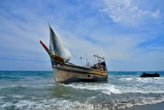 Rohingya land on Indonesian beach after weeks at sea