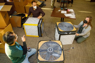 Researchers from Brown University and Silent Spring Institute with the Corsi-Rosenthal boxes (Pic: Ken Zirkel)