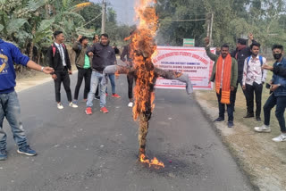 Protest by burning effigy of CM in Kokrajhar