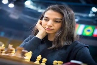 Iranian woman competes at chess tournament without hijab