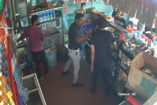 cheranellur ci taken into custody shop employee  cheranellur ci vipin kumar  കൊച്ചി ചേരനെല്ലൂർ സിഐ വിപിൻ കുമാർ  ci taken intocustody shop employee  ci taken intocustody shop employee visuals  കൊച്ചി ചേരനെല്ലൂർ സിഐ  ജീവനക്കാരന്‍റെ അവഗണനയിൽ രോഷവുമായി സിഐ  കടയിലെ ജീവനക്കാരൻ സിഐയെ അവഗണിച്ചു  കടയിൽ നിന്ന് ജീവനക്കാരനെ പിടിച്ചിറക്കുന്ന ദൃശ്യം  ജീവനക്കാരനെ കസ്റ്റഡിയിലെടുത്ത് സിഐ  സിഐക്കെതിരെ ജീവനക്കാരന്‍റെ മോശമായ പെരുമാറ്റം  കൊച്ചി ചേരനെല്ലൂർ ജംഗ്ഷൻ  സീറോ പോയിന്‍റ്  സിഐ കസ്റ്റഡിയിലെടുക്കുന്ന ദൃശ്യങ്ങൾ  മഫ്‌തി