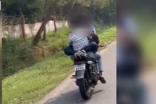 Young man did stunt on bike with girl