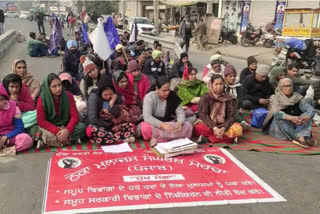 Demonstration by blocking the road by the contract employees of the DC office