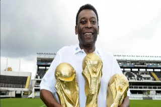 Pele with trophies
