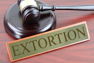 Accused Arrested for Extortion