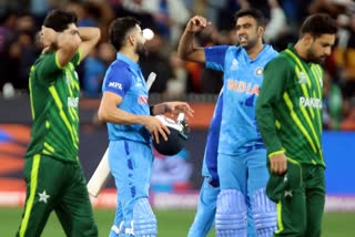 India's Virat Kohli and Ravichandran Ashwin react after winning the T20 World Cup cricket match between India and Pakistan at Melbourne Cricket Ground in Melbourne, Australia on Sunday, October 23, 2022.