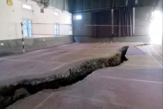Cracks developed in an indoor sports arena due to landslide