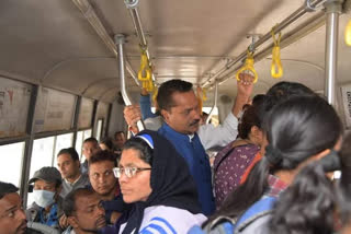 Minister Ashok Singhal on a city bus