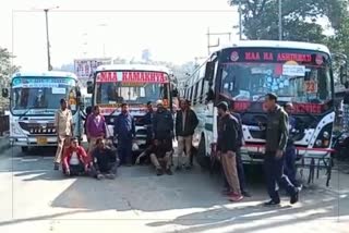 Khanapara city road blocked by City bus employee